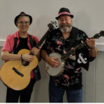 Two musicians, guitar, banjo